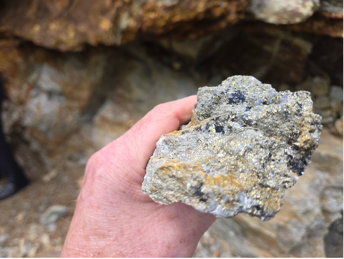 Photo 2 – Close up of a chunk of material used to build a section of the new logging road