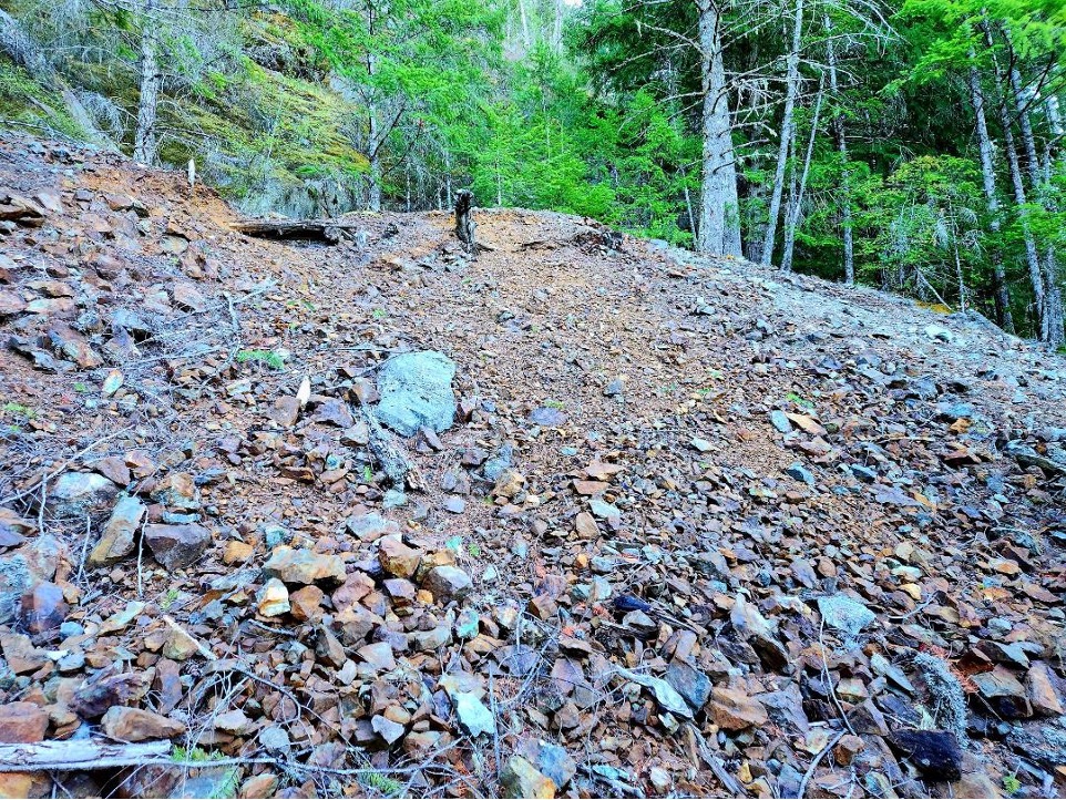 Photograph 1 – Large waste rock pile at Santana.
