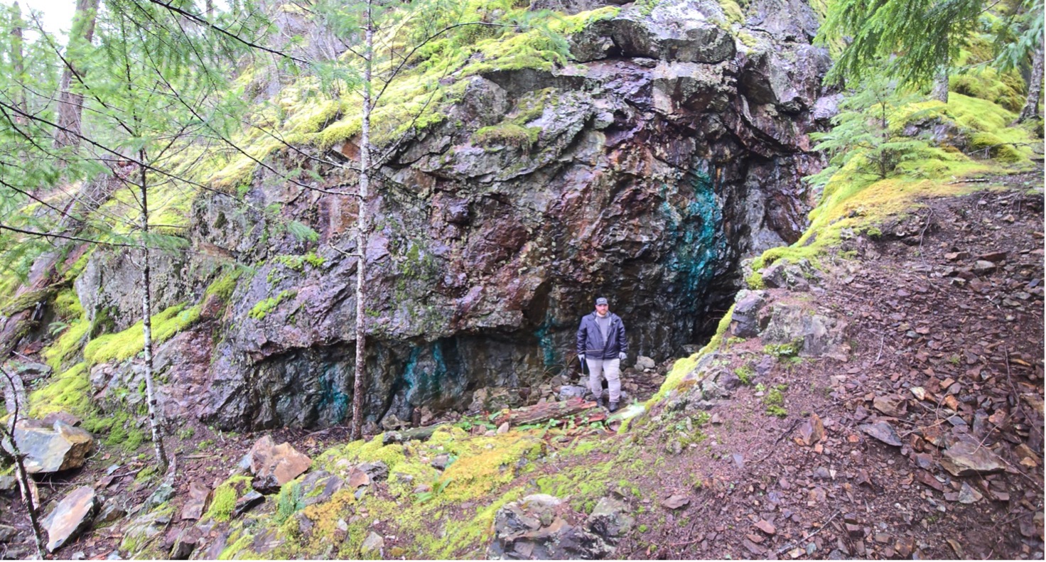 Photograph 3 – Main mine opening at Santana, with surface copper mineralization visible in surrounding bedrock.